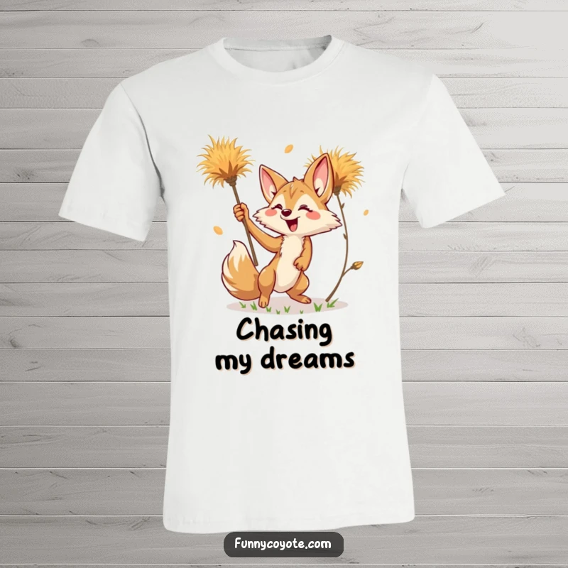 Funny Kawaii Coyote T-Shirt illustrating a coyote's comical attempt to catch a vibrant, falling tumbleweed.